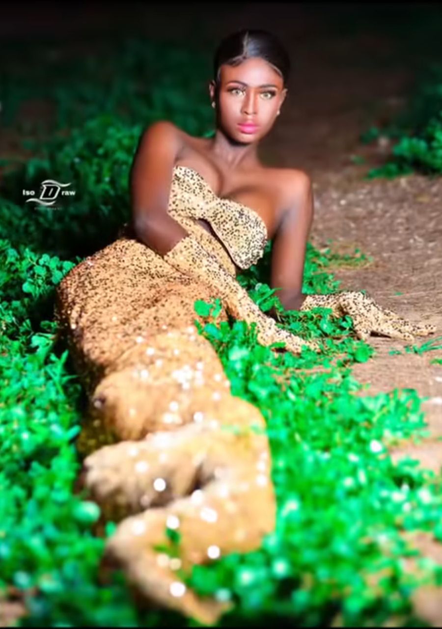Lady causes stir with snake-inspired birthday photoshoot (Video)