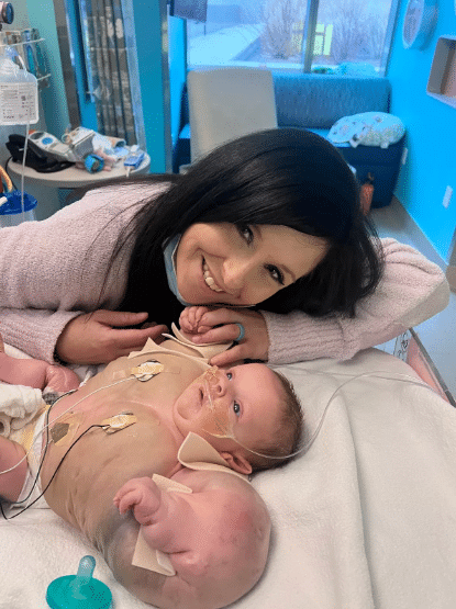 Baby born with extremely muscular chest and arms