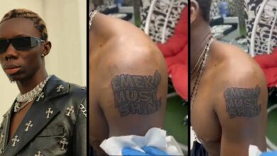 Blaqbonez reacts as diehard fan tattoos his name on his body in big case