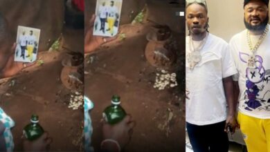 Mohbad's fan takes Naira Marley and Sam Larry's photo to shrine