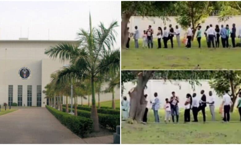 "It's not easy" - Reactions as Nigerians seen in a long queue at U.S embassy