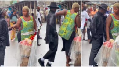 Man causes a stir as he dances like Michael Jackson beside lady in market, she pushes him away (Video)