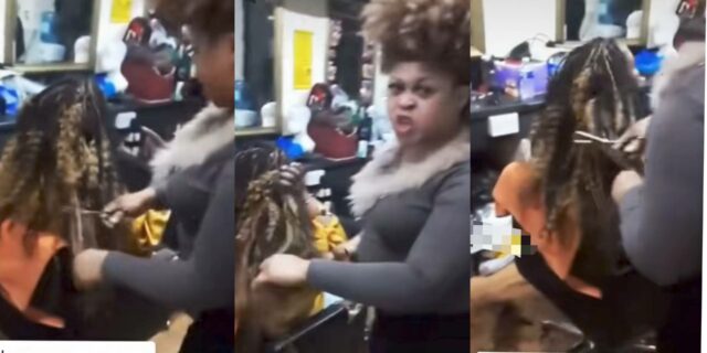 Hairstylist cuts customer's hair