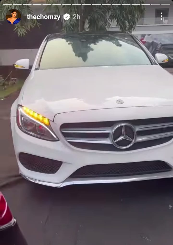 Money rains on Chomzy as boyfriend gifts her a new Mercedes Benz AMG