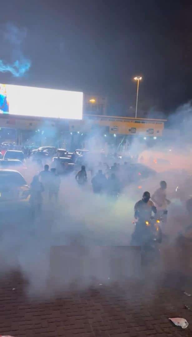 Mohbad: Moment Police disperse youths with teargas, protester injured at Lekki toll gate (Video)