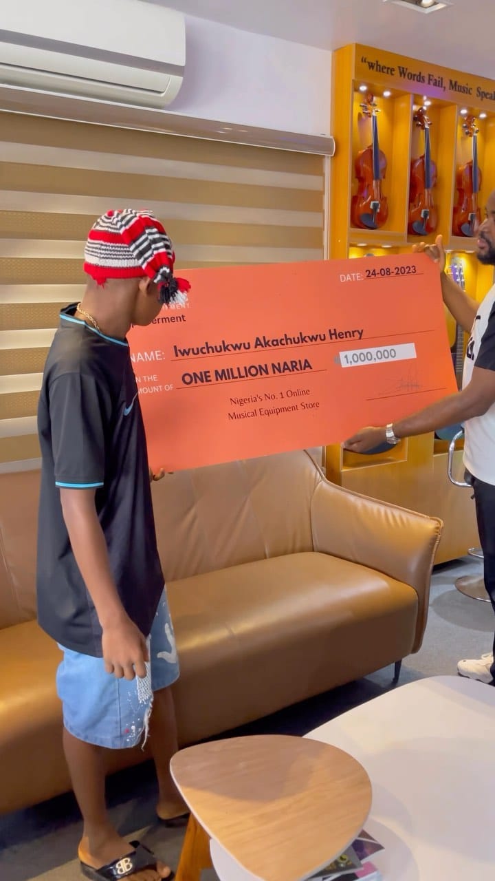 "There is God" - Reactions as man gifts egg hawker N1 million, he takes off his shirt in excitment