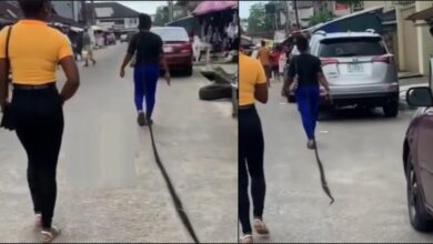 Lady sweeps the street of Uyo with her long braids (Video)