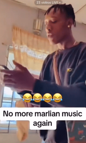 Man loses cool as his sister plays Naira Marley’s song in their house, seizes her phone (Video)