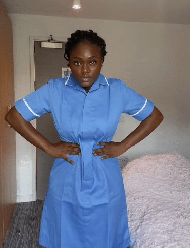 Lady over the moon as relocates to UK becomes certified midwife, shows off her blue uniforms