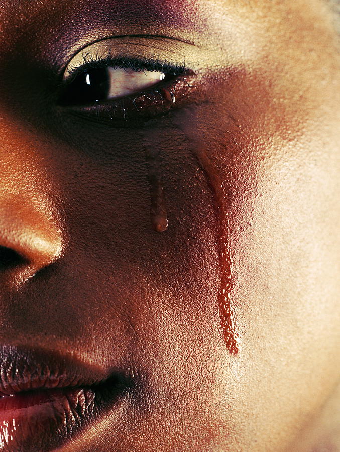 woman crying black tears