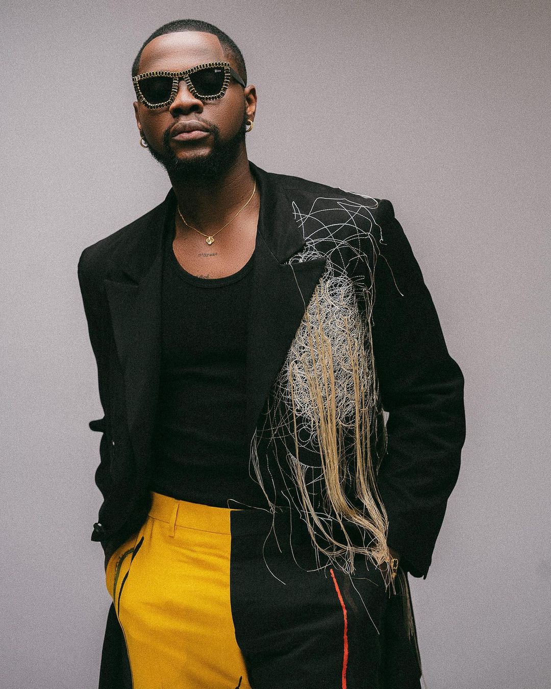 Kizz Daniel debunks being arrested 