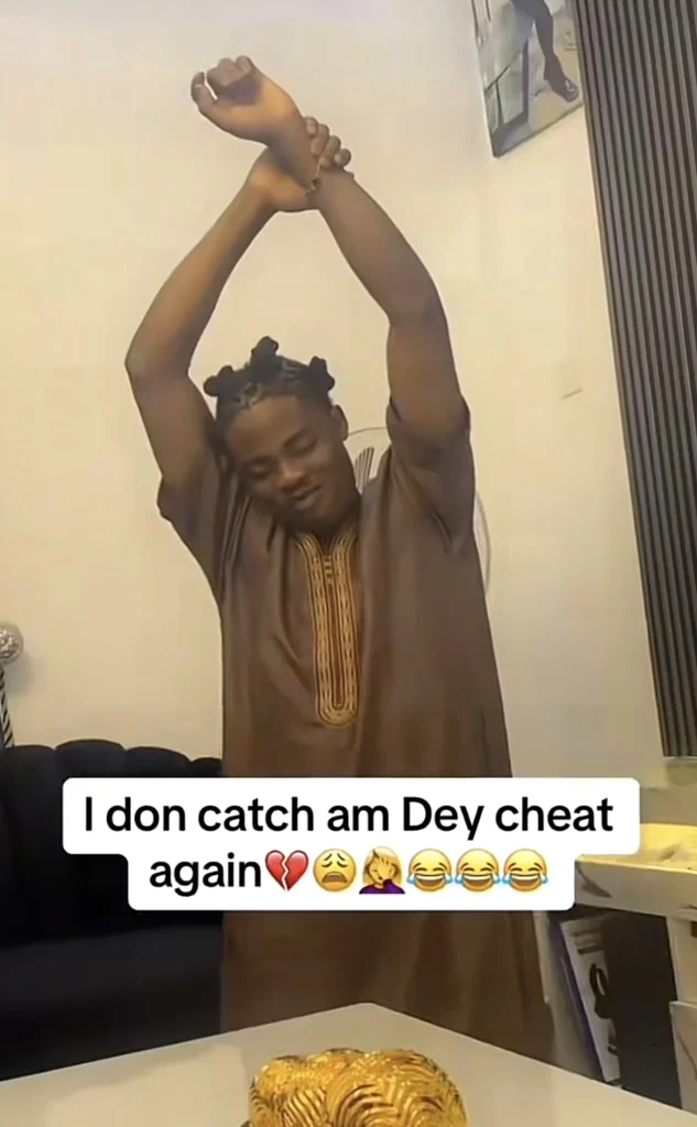 Lady disciplines boyfriend, forces him to kneel for cheating 