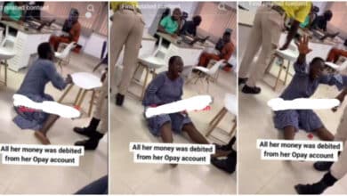 Nigerian woman throws herself on floor, weeps bitterly as all her money disappears from OPay account