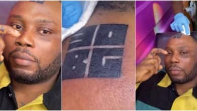 "Someone's 9 months in the potopoto" - Reactions as man tattoos Davido's 30BG slogan on forehead