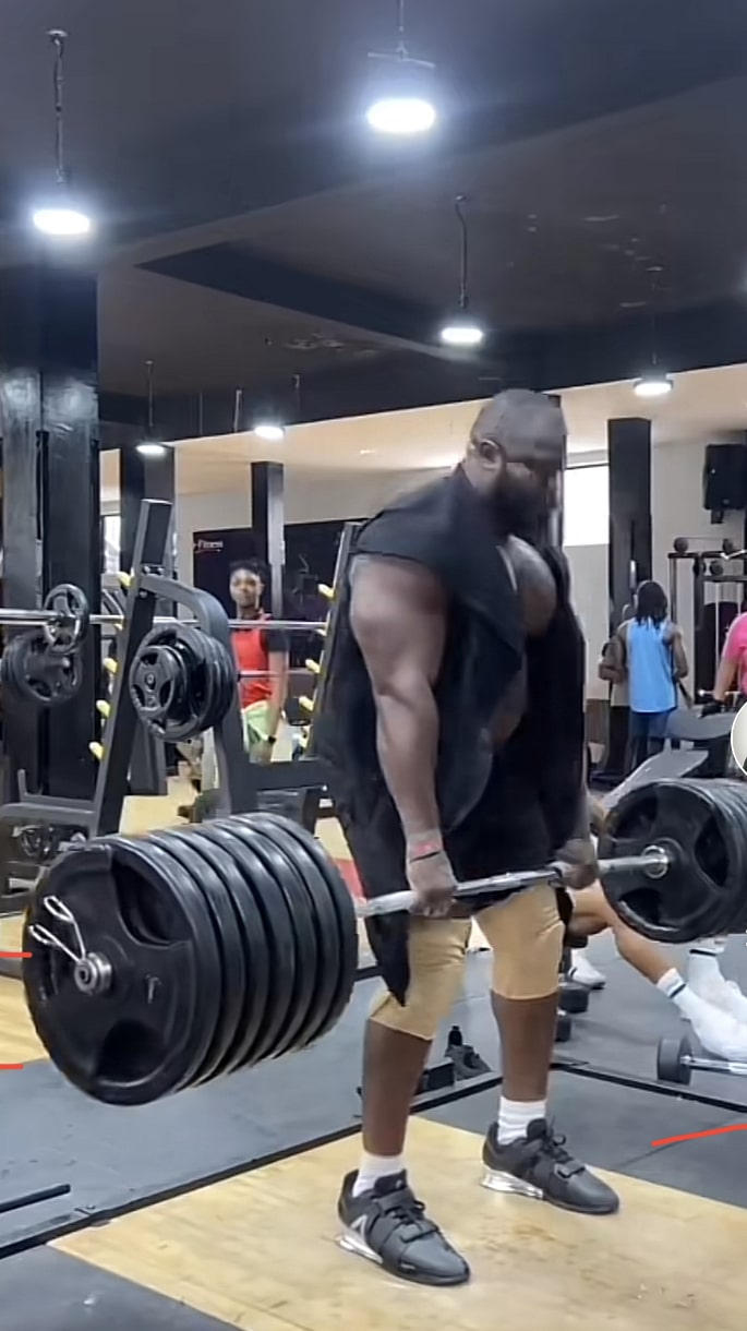 Kizz Daniel's bouncer who threw fan off stage causes buzz with his Gym workout videos