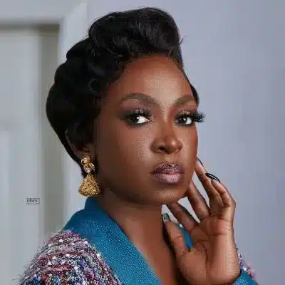 Kate Henshaw reacts after seeing a photoshopped photo of herself with strange man together