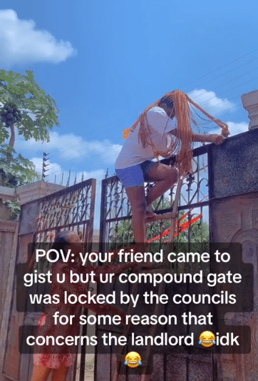 Nigerian lady causes buzz as she climbs locked gate to give her friend gist