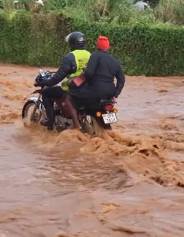 Okada man causes buzz as woman falls from his bike in attempt to cross flooded road, leaves her drenched in mudwater