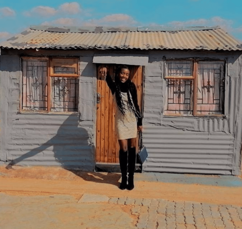 Young and proud - 20-year-old lady celebrates as she becomes a homeowner at a tender age