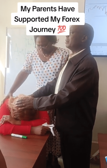Parents cause buzz as they are spotted laying hands, praying for daughter doing Forex 
