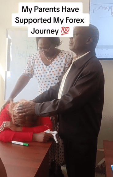 Parents cause buzz as they are spotted laying hands, praying for daughter doing Forex