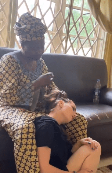 Woman spotted braiding her Oyinbo daughter-in-law's hair