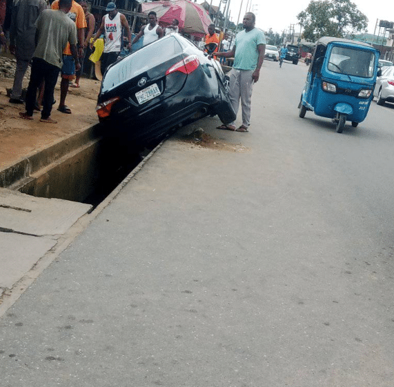 Moment car wash attendant narrowly escapes death after crashing customer's vehicle while test driving it in Port Harcourt