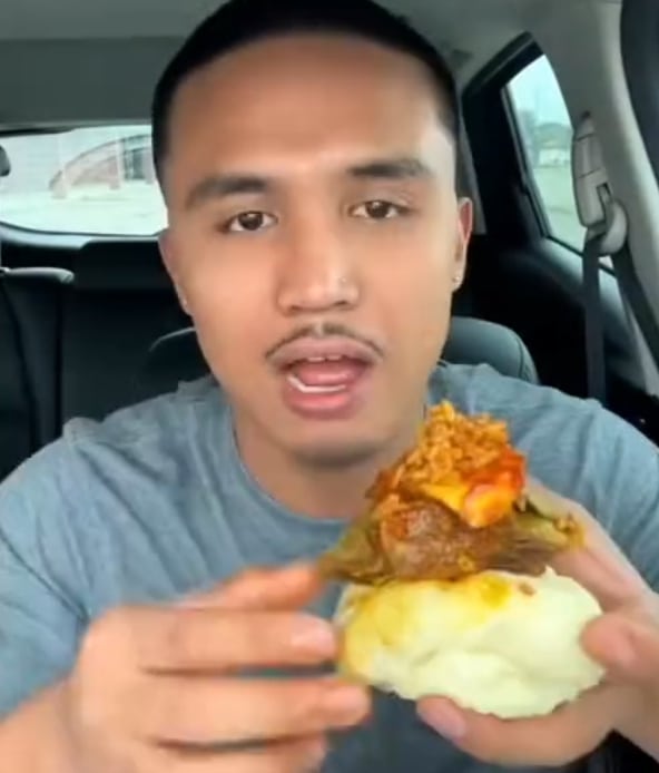 American man egusi fufu Nigerian jollof rice