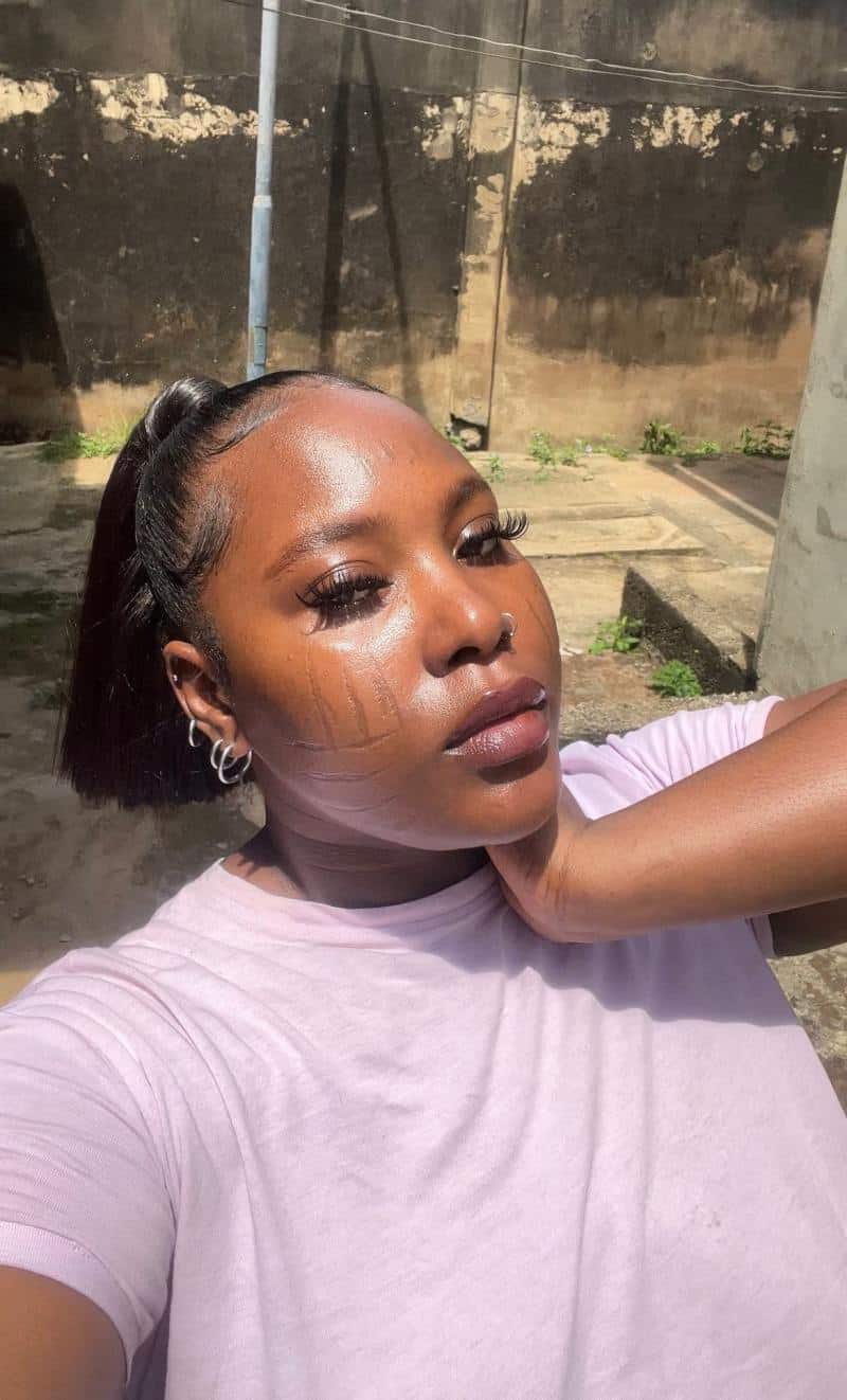 Heartwarming reactions trail photos of beautiful lady with tribal marks