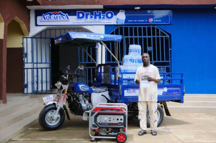 Aquafina empowers viral hawker, Dr. H2O, rewards him with full business setup worth millions of naira