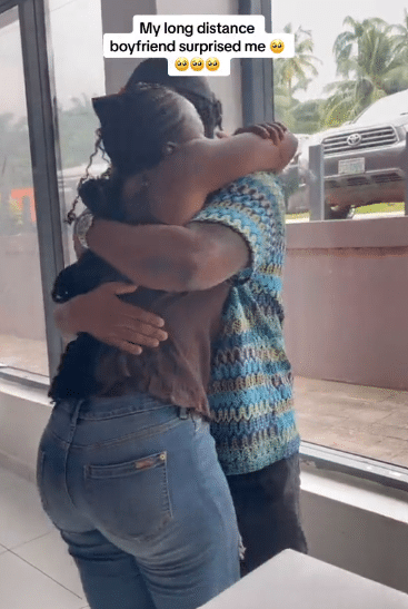 Lady shocked, overjoyed as her boyfriend makes a surprise return to Nigeria from the UK to see her