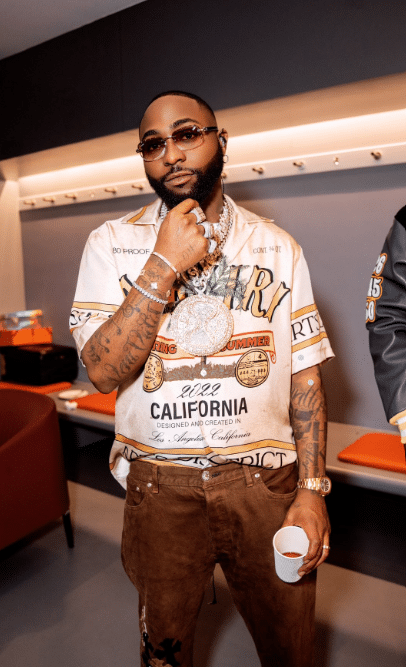 Davido spotted leading team in prayers before performance in Australia