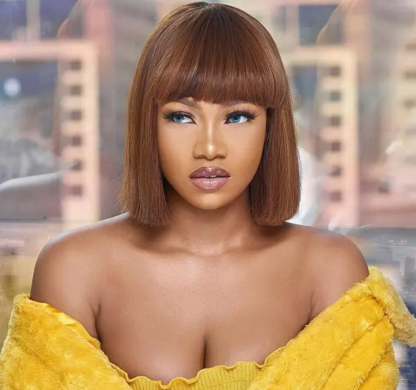 "You tattooed Davido on your breast at 19" - Lady drags Tacha for supporting parents who Insulted daughter over iPhone 8