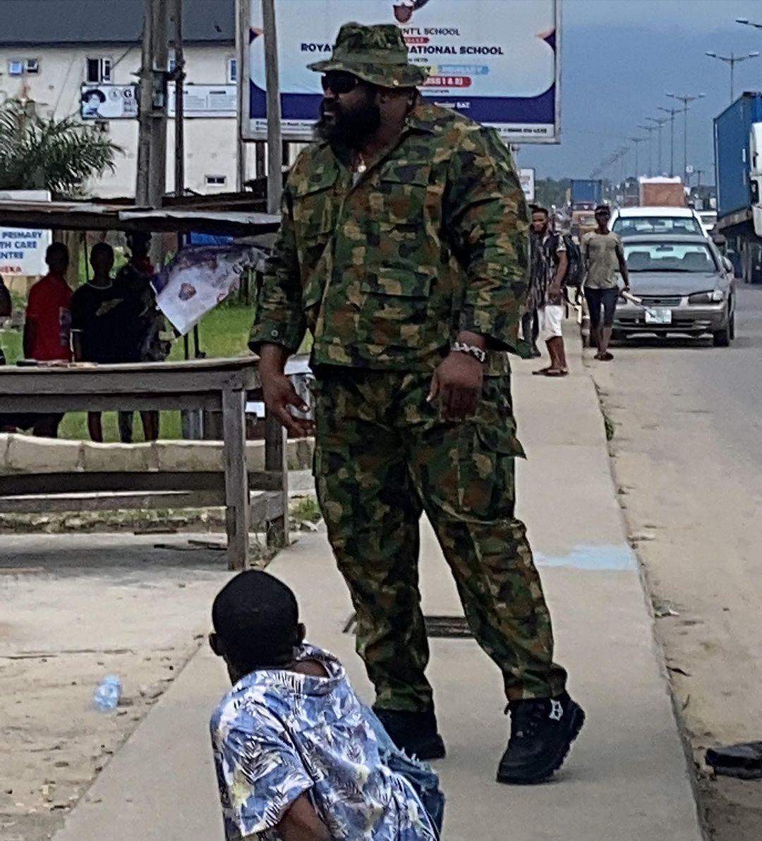 Soldier Kizz Daniel's bouncer camouflage