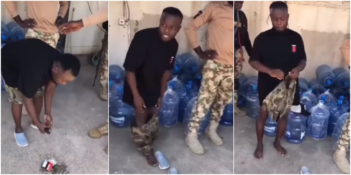 Video shows Nigerian soldiers dealing with a man caught wearing military camouflage
