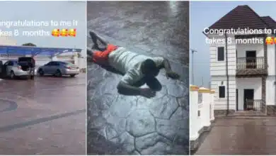 "God did it in 8 months" - 20-year-old man overjoyed, lies on floor as he builds mansion at age 20 in Anambra