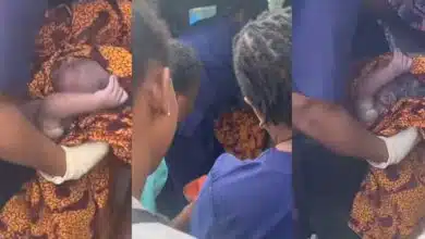 Woman birth baby girl passenger bus Warri