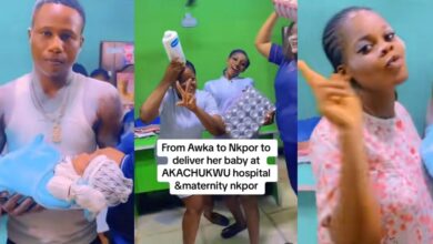 Overjoyed husband, wife bathe in powder, shows off dance moves in hospital as they celebrate arrival of new baby