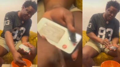 "My phone no go kill me" - Nigerian man causes stir online as he cools iPhone 12 Pro Max overheating problem with cold water