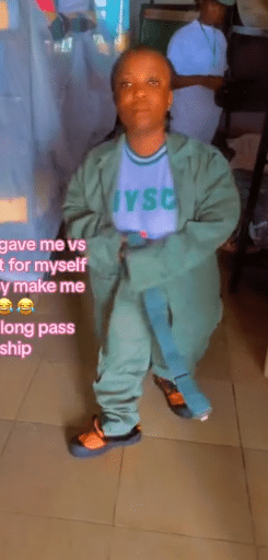 "Is the shoe for me?" - Female corper with unique stature causes buzz as she displays her oversized NYSC Khaki