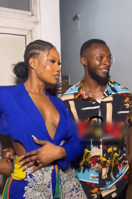 tacha remove guy's hand waist