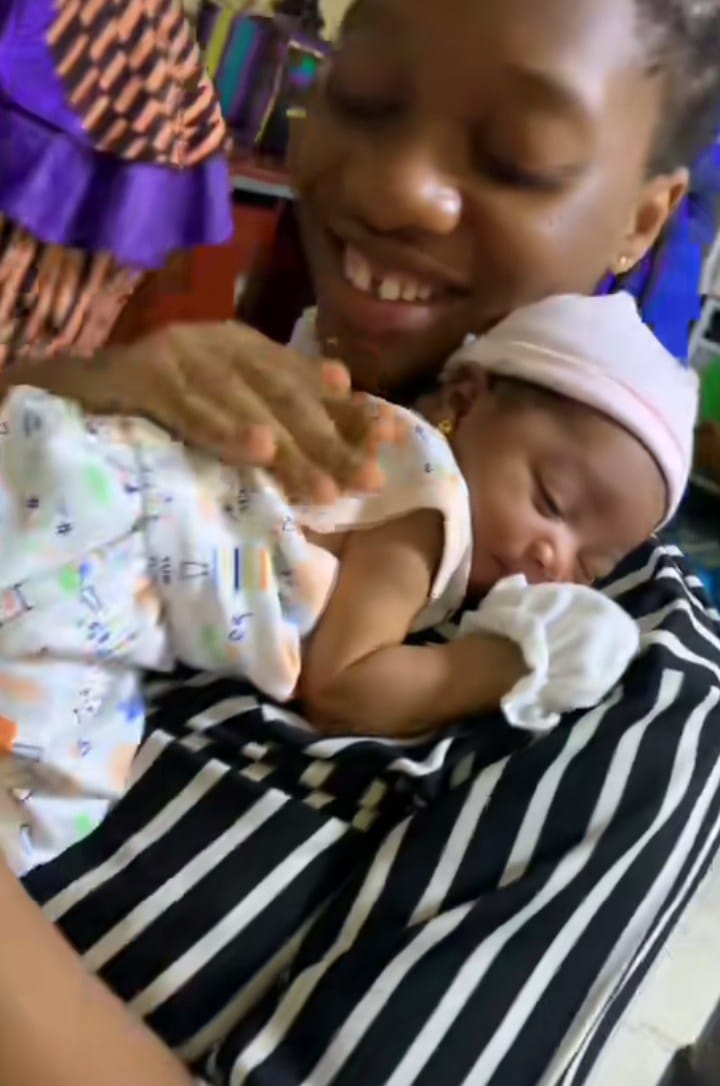 Lady unzip dress baby