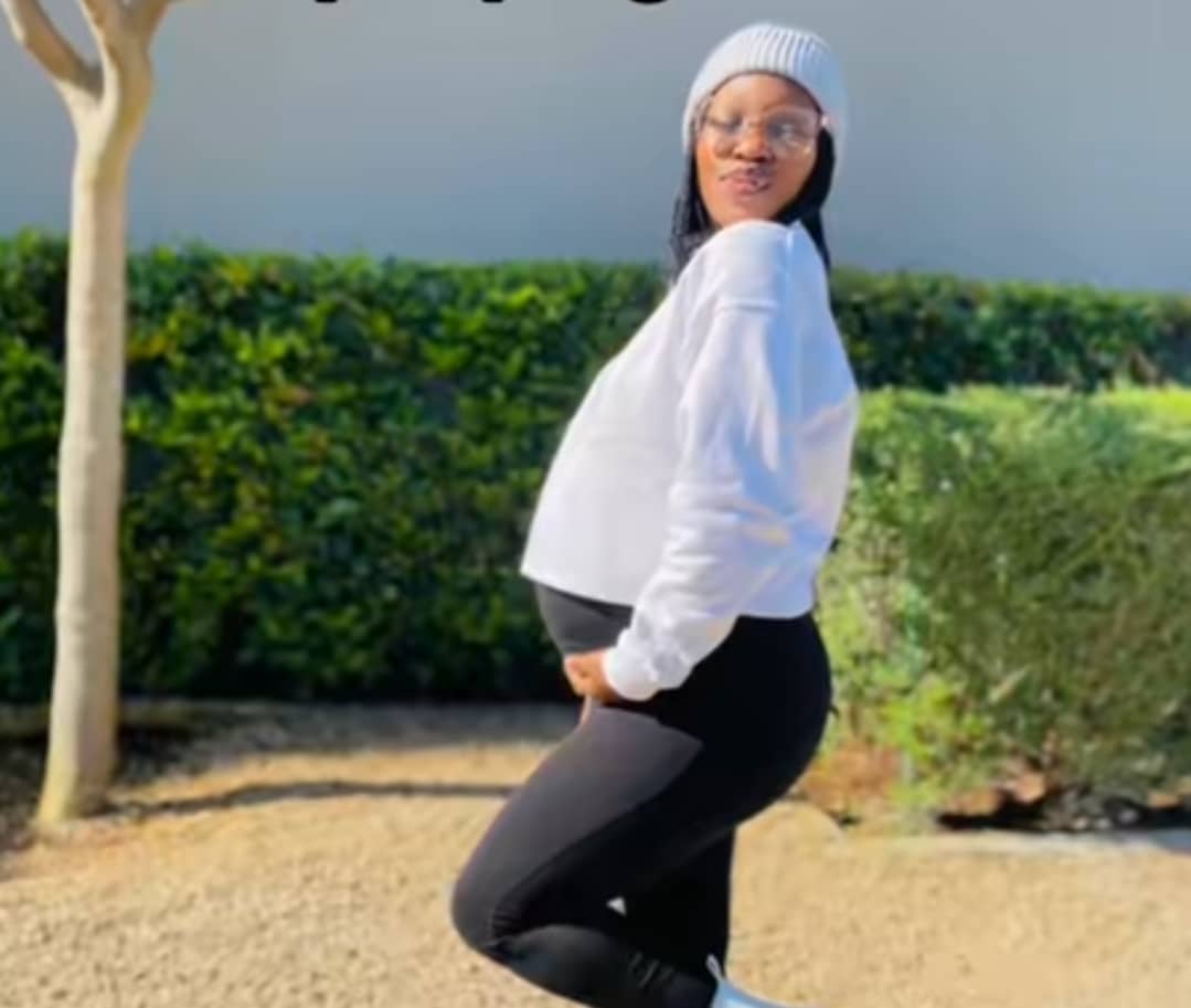 "Mine kicked me out" - Lady causes stir, posts lovely father-son photo despite threat of disownment over pregnancy