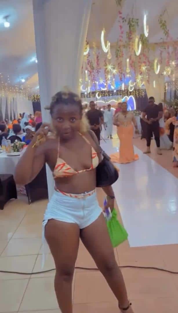 Lady's outfit to wedding reception sparks outrage 