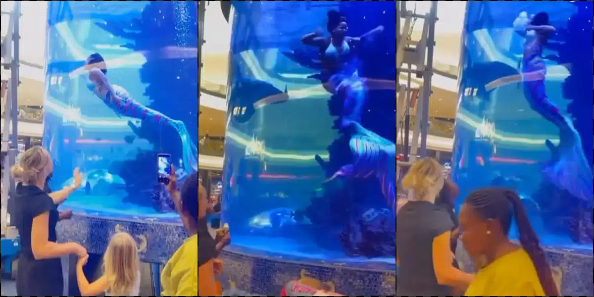 Moment mermaid almost drowns in an aquarium tank