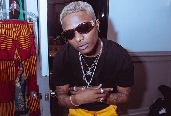 Wizkid threatened god of iron impatient fan release new songs