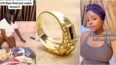 Lady stuns many as she shows expensive gold ring she found in bale of Okirika clothes