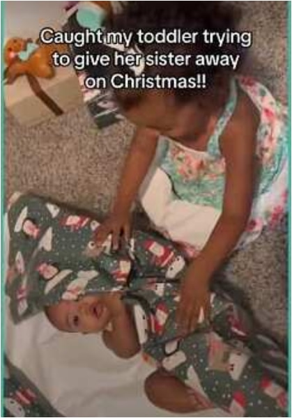 "Sibling rivalry don start" - Little girl wraps baby sister to give away as Christmas present