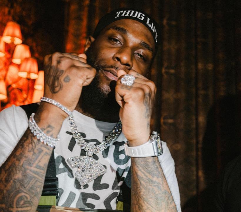 Burna Boy flaunts newly acquired million-dollar custom diamond chain