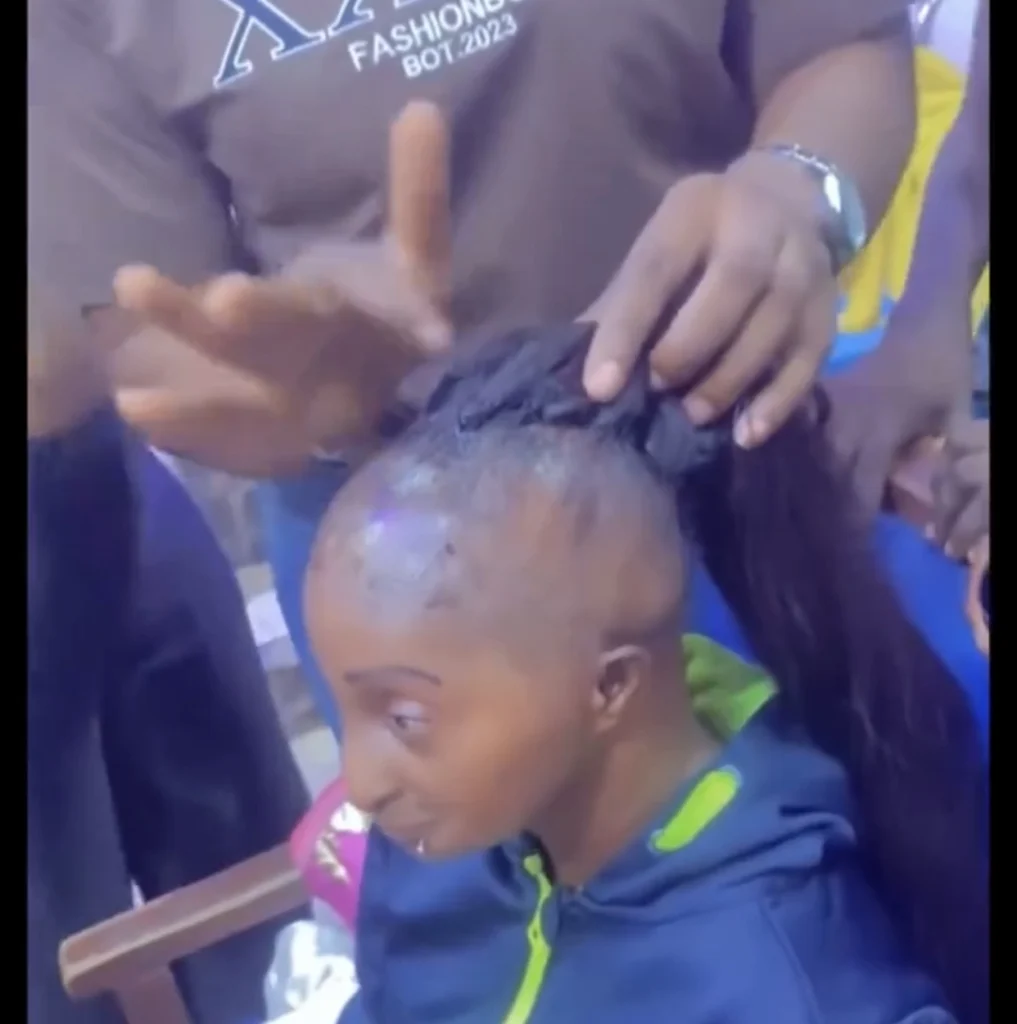 “Mini Jet Li” — Netizens questions as hairstylist make “frontal” ponytail for Aunty Ramota
